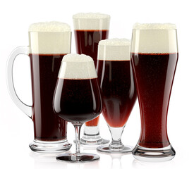 Set of fresh stout beer glasses with bubble froth isolated on white background.