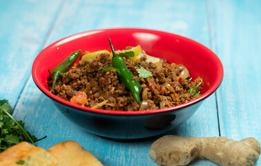 Qeema karahi with vegetable roghni naan India and Pakistan food 