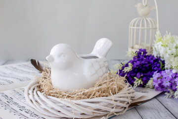 Easter decoration with bird and lilac, inspiration concept
