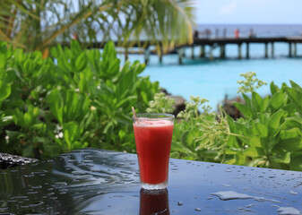 sweet watermelon cocktail on the table in nature