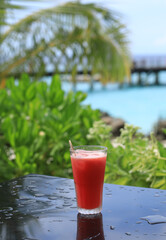 sweet watermelon cocktail on the table in nature