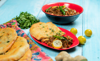 Qeema karahi with vegetable roghni naan Pakistan and India food