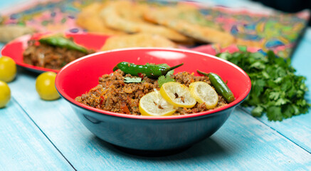 Qeema karahi with vegetable roghni naan Pakistan and India food 