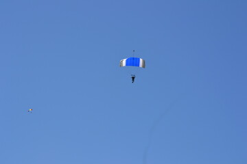 paragliding in the blue sky