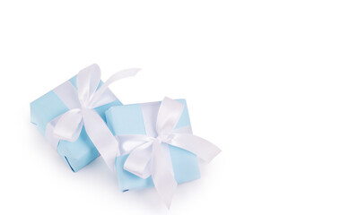 Two blue gift boxes copy space. Gifts with bow isolated on white background