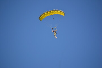 paragliding in the blue sky