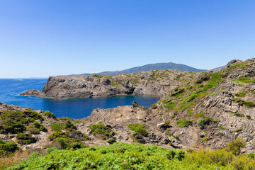 Fototapeta na wymiar blue sky and sea in cap de creus, near cadaques in the north of girona on the costa brava