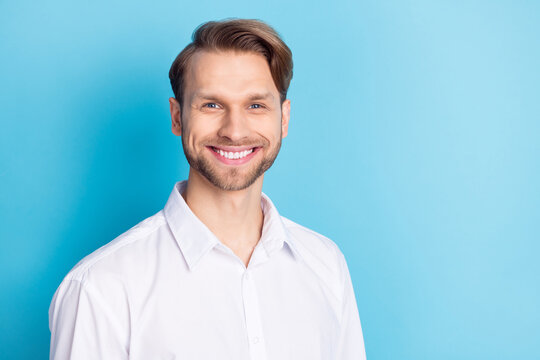 Photo of happy positive charming young man smile businessman isolated on pastel blue color background