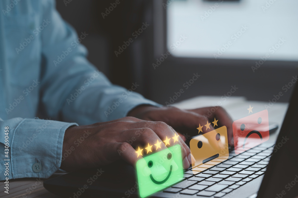 Poster customer satisfaction survey concept, businessman using computer laptop select smiley face icon with