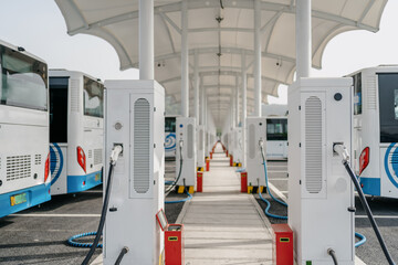 bus is charging in power station © THINK b