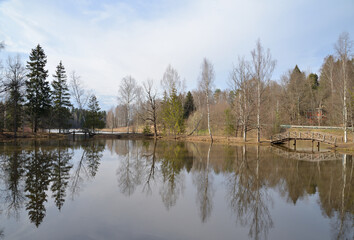 Lower pond with wooden bridges in spring park, Abramtsevo Museum, Abramtsevo, near town of Sergiev Posad, Moscow  region, Russia