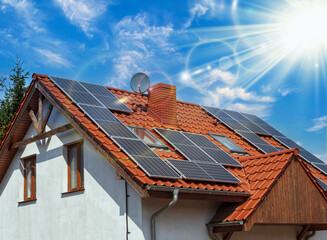 Solar photovoltaic panels on a house roof. Solar system