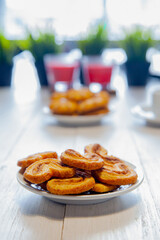 oatmeal cookies stands on a wooden table