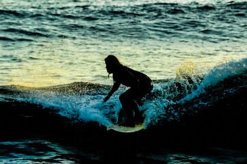 Silhouette Surfer at Sunset