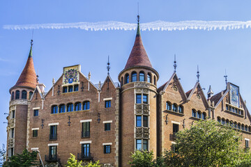 View of Casa de les Punxes (Casa Terradas) - building reminiscent of old medieval castle, with elements of different architectural trends, with six pointed towers. Avinguda Diagonal, Barcelona, Spain.
