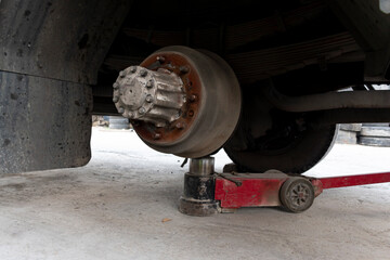 Truck change wheels using a lifting jack.