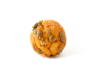 Pumpkin muffin topped with pumpkin seeds