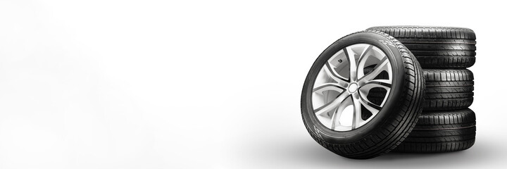 Fototapeta summer tires and wheels-stack on white background, new wheels long blank layout copyspace obraz