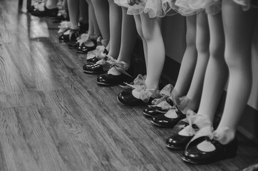 Tap dancing girls waiting in line.