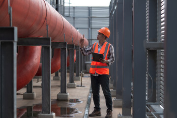 Worker  site walk on site construction. Senior engineer walk on construction  check workflow....