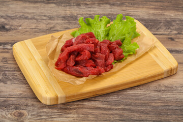 Raw beef meat sliced for cooking