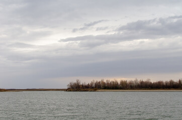 View of the autumnal bank of the Irtysh River in the Omsk Region.