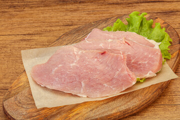 Raw pork steak for cooking