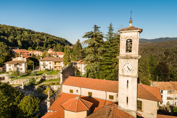 Aerial view of the Parish Church chapel of Sant Appiano in ancient village Castello Cabiaglio,...
