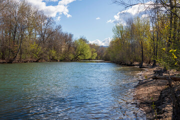 The beautiful waters of the Boise River flow through Boise, Idaho on a beautiful sunny spring day.