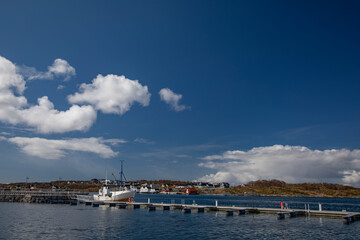 Fototapeta na wymiar City walk and spring in the air, with white clouds - Here Brønnøysund guest harbor,Helgeland,Nordland county,Norway,scandinavia,Europe