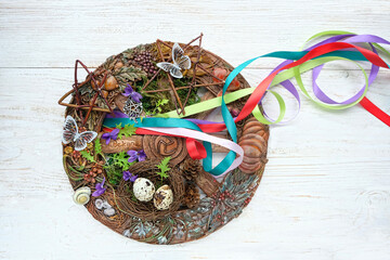 Wiccan altar for Beltane sabbath. spring pagan festive ritual. wheel of the year with colorful...