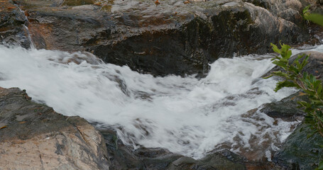 Water flows though the brook