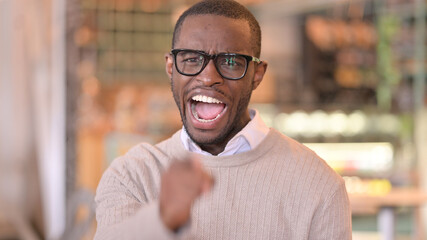Fototapeta premium Portrait of Angry African Man Arguing, Fighting 