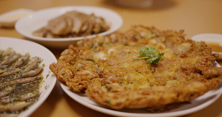 Pan fried oyster omelette in restaurant