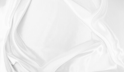 White gray satin texture that is white silver fabric silk background with beautiful soft blur pattern natural.