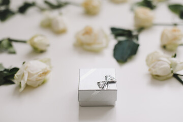 Fototapeta na wymiar jewelry ring box and white roses. Wedding, Love, Valentine's day, Happy Birthday concept