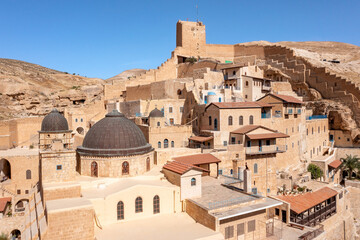 Fototapeta premium Mar Saba Greek Orthodox Monastery in Israel Judaean Desert, Aerial view.