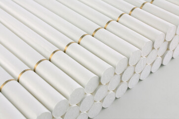 Fototapeta premium new cigarettes in rows row showing filter end