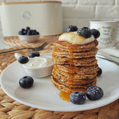 pancakes with blueberries and honey