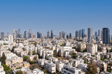Tel Aviv skyline over Kikar Hamedina square with business district skyscrapers in the horizon, Aerial view.