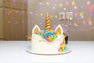 birthday cake with candles and confetti