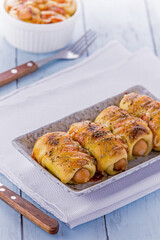 Mini pizza with sausage and cheese