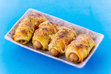 Mini pizza with sausage and cheese