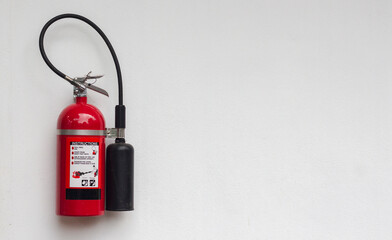 Carbon Dioxide (CO2) Extinguishers On a white wall