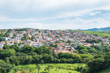 Fototapeta na wymiar View of the urban area of the Brazilian Mineira city of São Roque de Minas. Wide view of the city buildings. Touristic Inland city of Minas Gerais, eco tourism destination.
