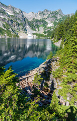 Beautiful pristine alpine wilderness lake under blue skies.