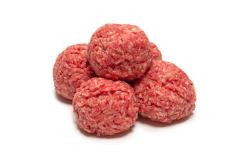 Raw meat balls isolated on white background.