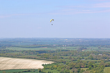 Paraglider flying at Combe Gibbet, England