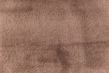 Brown colour velour textile sample. Fabric texture background