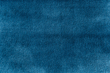 Blue colour velour textile sample. Fabric texture background